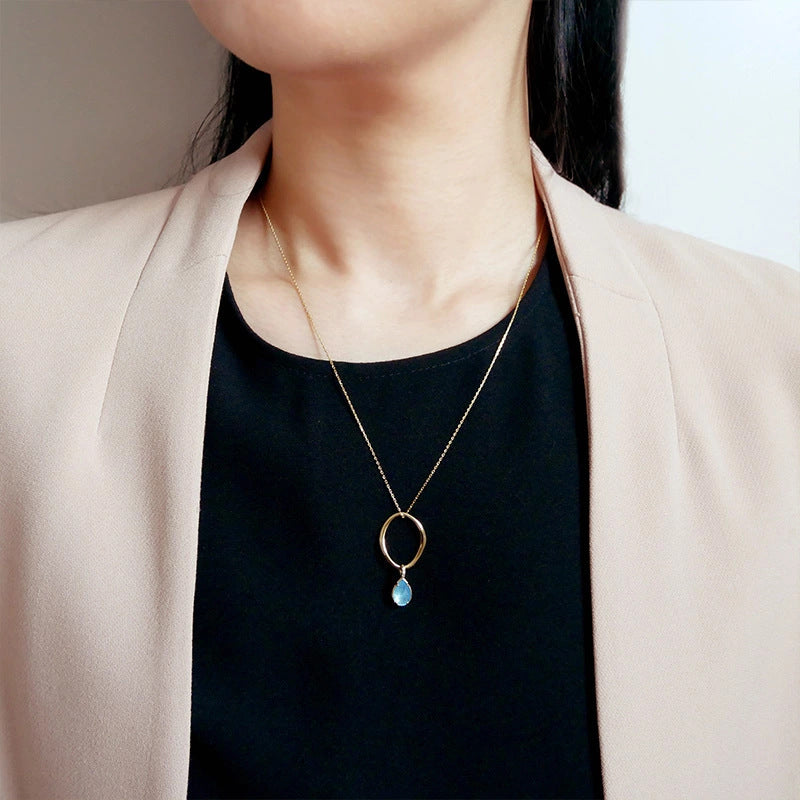Teardrop Blue Topaz Circle Pendant